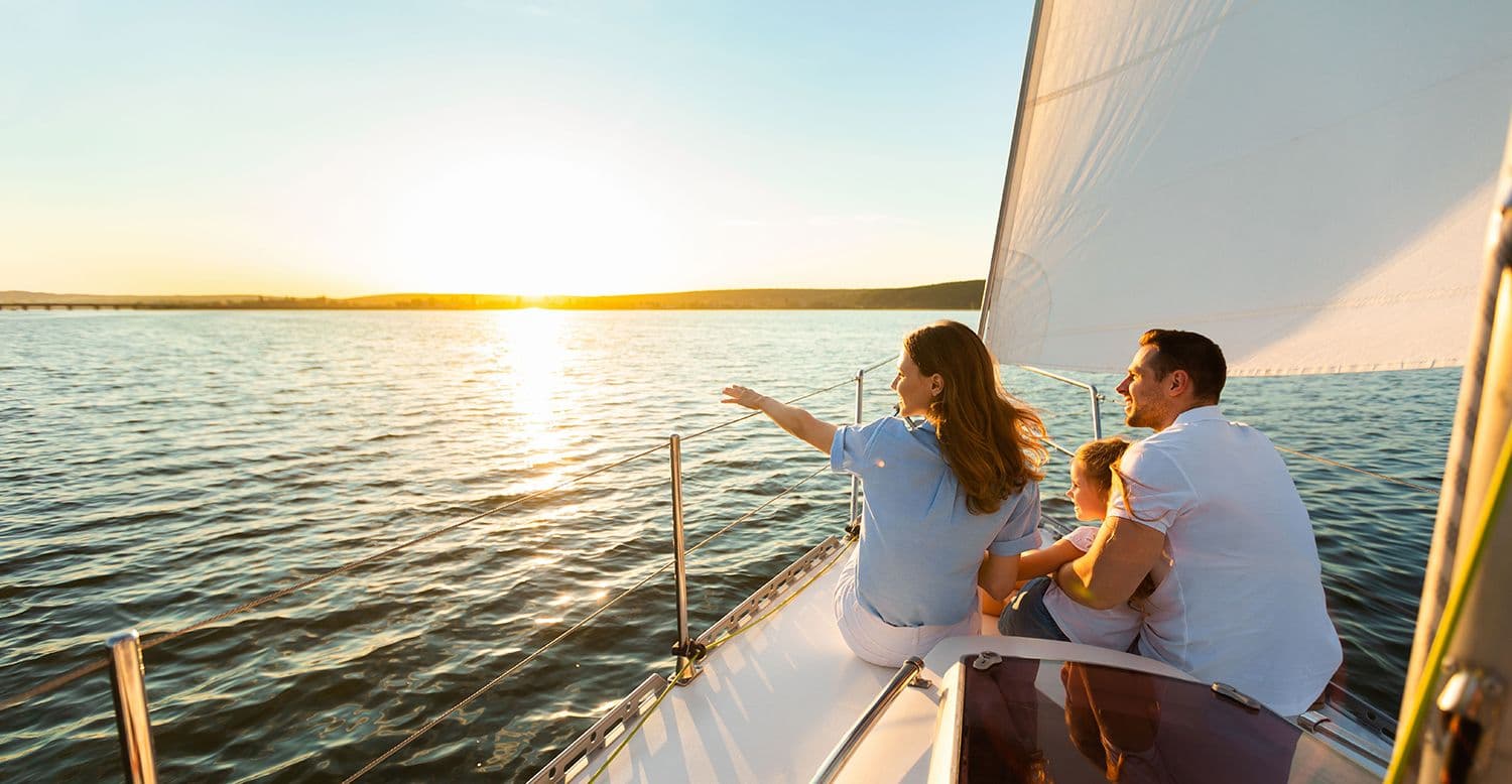 Couple on a boat in the ocean.