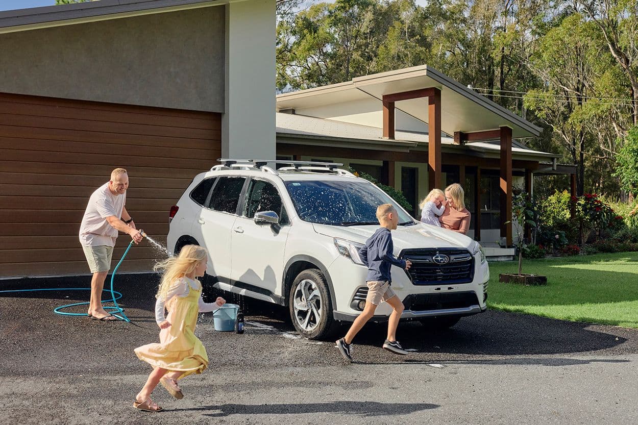 Family washing car