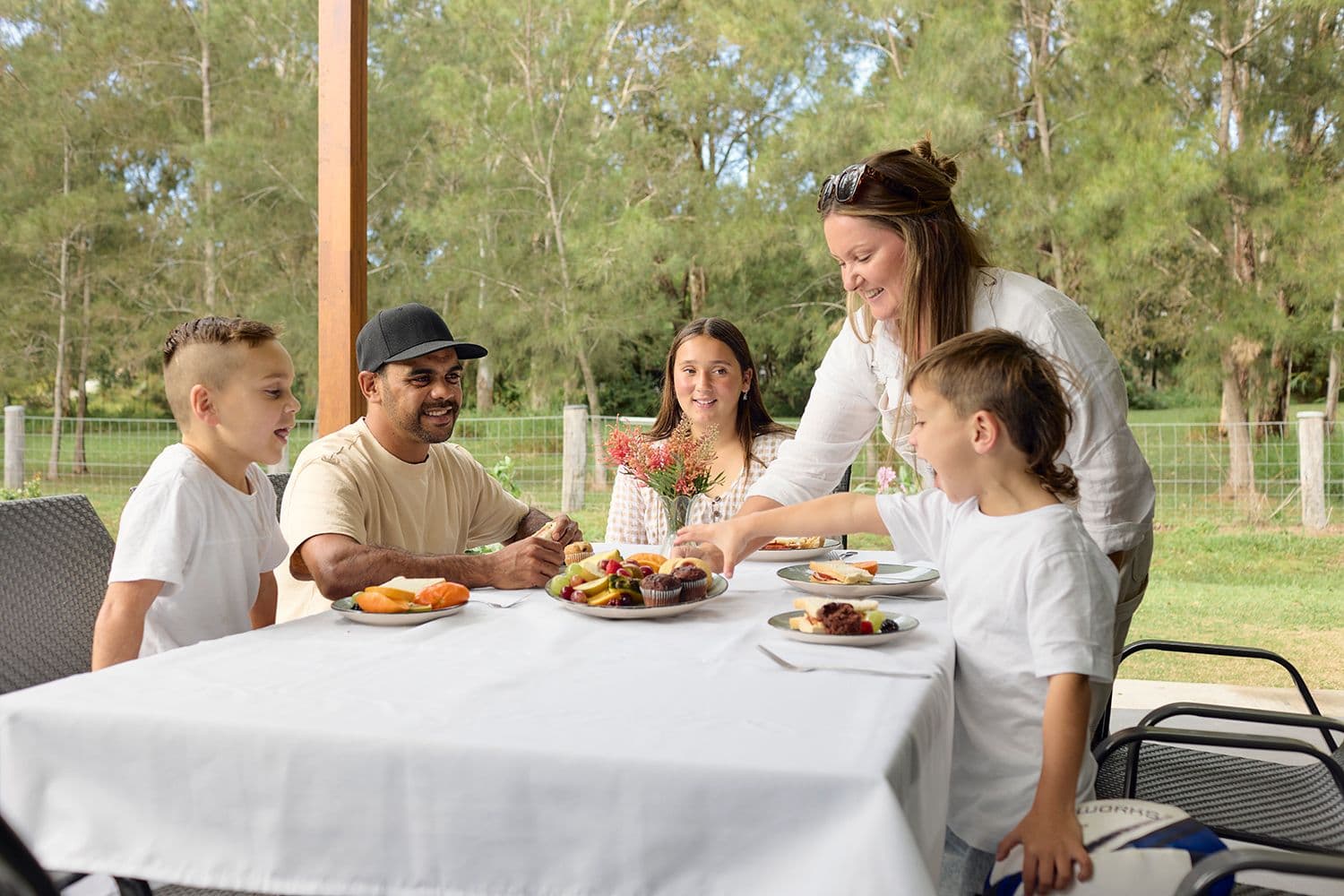 Family at a table eating lunch