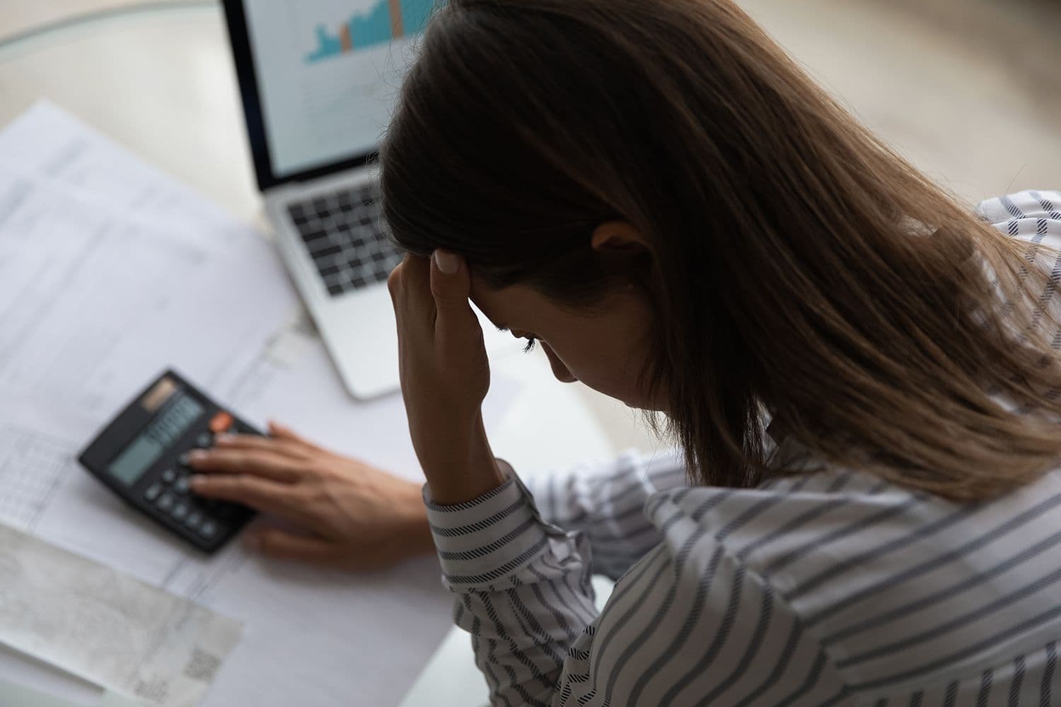 Women calculating her investments